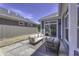 Covered patio featuring comfortable lounge seating and views of the backyard at 16822 Imperial Ct, Fishers, IN 46040