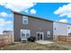 Wide shot of a backyard featuring a patio area, grill, and swing set, ideal for outdoor gatherings at 1835 Fairmount Dr, Greenfield, IN 46140