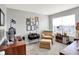 Cozy bedroom with a desk, comfortable chair and ottoman, perfect for relaxation or a home office at 1835 Fairmount Dr, Greenfield, IN 46140