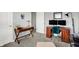Bright bedroom with a desk setup and adjacent doorway providing ample workspace and easy access at 1835 Fairmount Dr, Greenfield, IN 46140