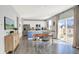 Open-concept dining area next to the kitchen and sliding glass doors offering backyard views at 1835 Fairmount Dr, Greenfield, IN 46140