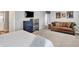 Bright main bedroom featuring a comfy sitting area, and neutral color scheme at 1835 Fairmount Dr, Greenfield, IN 46140