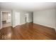 Hardwood floors connect the living space to the kitchen in this open floorplan at 226 N 8Th Ave, Beech Grove, IN 46107