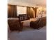 Finished basement area with drop ceiling, home theater screen, accent lighting, and comfortable seating at 2317 Lincoln Dr, Cicero, IN 46034
