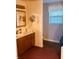 Bright bathroom featuring a vanity with sink and mirror, window, and vinyl flooring at 2317 Lincoln Dr, Cicero, IN 46034