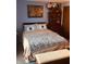 Bedroom featuring a bed, blanket, and decorations creating a cozy, decorated space at 2317 Lincoln Dr, Cicero, IN 46034