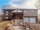 Charming two-story home featuring a welcoming porch and attached two car garage at 2317 Lincoln Dr, Cicero, IN 46034