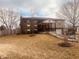 Charming two-story home with brick and siding exterior, covered front porch, and mature trees at 2317 Lincoln Dr, Cicero, IN 46034