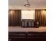 Home theater features projector, decorative cabinets, and plush seating, perfect for entertainment at 2317 Lincoln Dr, Cicero, IN 46034