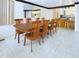 Inviting dining room with hardwood table and chairs, open to the kitchen at 2613 E 7Th St, Anderson, IN 46012