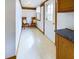 Bright mudroom with door to the exterior, tile floors, and convenient storage at 2613 E 7Th St, Anderson, IN 46012