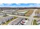 Vast aerial view showcases the scale of this new residential community and scenic pond at 2792 Maricopa Blvd, Whitestown, IN 46075