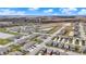 Expansive aerial view features a developing neighborhood with townhomes, single-Gathering homes, and scenic pond at 2792 Maricopa Blvd, Whitestown, IN 46075