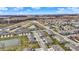 An attractive aerial view showcasing a vibrant community with charming homes, picturesque ponds, and well-maintained landscaping at 2792 Maricopa Blvd, Whitestown, IN 46075