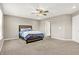 This bright bedroom features a ceiling fan, recessed lighting, and a neutral color scheme at 2792 Maricopa Blvd, Whitestown, IN 46075