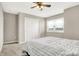 Bedroom featuring carpet flooring, a ceiling fan, a double window, and a gray bedspread at 2792 Maricopa Blvd, Whitestown, IN 46075