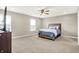 Spacious bedroom with large windows, a ceiling fan and neutral carpeting at 2792 Maricopa Blvd, Whitestown, IN 46075