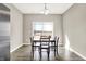 Charming dining space with natural light and view, creating a pleasant ambiance for dining and gathering at 2792 Maricopa Blvd, Whitestown, IN 46075