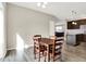 A dining area that seamlessly connects to the modern kitchen and inviting living space at 2792 Maricopa Blvd, Whitestown, IN 46075