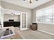 Bright office space with neutral walls, french doors, modern desk, and a window view at 2792 Maricopa Blvd, Whitestown, IN 46075
