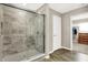 Features of the bathroom include a tiled shower and wood-look floors at 2792 Maricopa Blvd, Whitestown, IN 46075