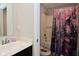 Features a bathtub with a patterned curtain and vanity at 2976 W Tapestry Dr, Monrovia, IN 46157