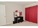 Bedroom with vanity featuring mirror, black desk, and red curtains at 2976 W Tapestry Dr, Monrovia, IN 46157