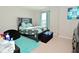 Features a bedroom with large bed and teal accents at 2976 W Tapestry Dr, Monrovia, IN 46157