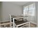 Bright dining area featuring natural light, bench seating, and stylish flooring for comfortable meals at 2976 W Tapestry Dr, Monrovia, IN 46157