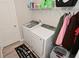 Laundry room featuring a set of new, white, front-loading washer and dryer at 2976 W Tapestry Dr, Monrovia, IN 46157