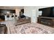 Inviting living room with an open layout, seamlessly connected to the kitchen and featuring contemporary furnishings at 2976 W Tapestry Dr, Monrovia, IN 46157