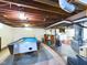 Spacious basement with pool table and utility sink at 3016 Sheridan St, Anderson, IN 46016