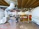 Unfinished basement with exposed beams and utilities at 3016 Sheridan St, Anderson, IN 46016