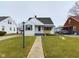 Charming single-story home with well-maintained lawn and covered entry, providing a welcoming curb appeal at 3016 Sheridan St, Anderson, IN 46016