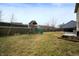 Large backyard features a playset and grass at 307 Blue Spruce Dr, Pendleton, IN 46064