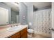 Inviting bathroom featuring a single sink vanity and charming unicorn shower curtain at 307 Blue Spruce Dr, Pendleton, IN 46064