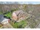 Aerial view of the property showcasing the house, garage, and surrounding landscaping at 3376 Scramble Dr, Greenwood, IN 46143