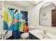 Clean bathroom with a colorful shower curtain and a vanity with lots of counter space at 3376 Scramble Dr, Greenwood, IN 46143
