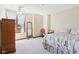 Comfortable bedroom with carpet flooring, lots of natural light, and nice decor at 3376 Scramble Dr, Greenwood, IN 46143