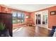 Welcoming living room featuring hardwood floors, a large window, and decorative trim at 3376 Scramble Dr, Greenwood, IN 46143