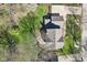 An aerial view capturing the roofline and driveway surrounded by greenery in a serene residential setting at 3376 Scramble Dr, Greenwood, IN 46143