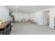 Spacious basement with neutral carpet, ample lighting, and versatile space for recreation and relaxation at 4317 N Park Ave, Indianapolis, IN 46205