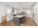 Bright kitchen featuring a large island with seating and modern appliances at 4317 N Park Ave, Indianapolis, IN 46205