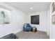 Cozy room featuring a comfortable chair by a window and stylish decor at 4317 N Park Ave, Indianapolis, IN 46205