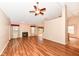Inviting living room with hardwood floors, a fireplace, and large windows offering plenty of natural light at 5300 Breakers Way, Carmel, IN 46033