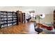 Spacious bedroom with hardwood floors, filled with natural light and built in storage shelves at 60 Huddleston N Dr, Indianapolis, IN 46217