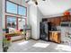 Bright kitchen featuring updated appliances, tile floors, and vaulted ceiling at 60 Huddleston N Dr, Indianapolis, IN 46217