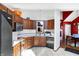 Kitchen with ample counter space, tile floors, and wooden cabinets at 60 Huddleston N Dr, Indianapolis, IN 46217