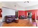 Inviting living room with hardwood floors, comfortable sofas and lots of space at 60 Huddleston N Dr, Indianapolis, IN 46217