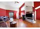 Bright and airy living room with vaulted ceilings and hardwood flooring at 60 Huddleston N Dr, Indianapolis, IN 46217